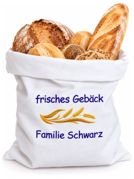 Weißer Brötchenbeutel mit Namen bestickt, gefüllt mit Brot, Brötchen und Baguette