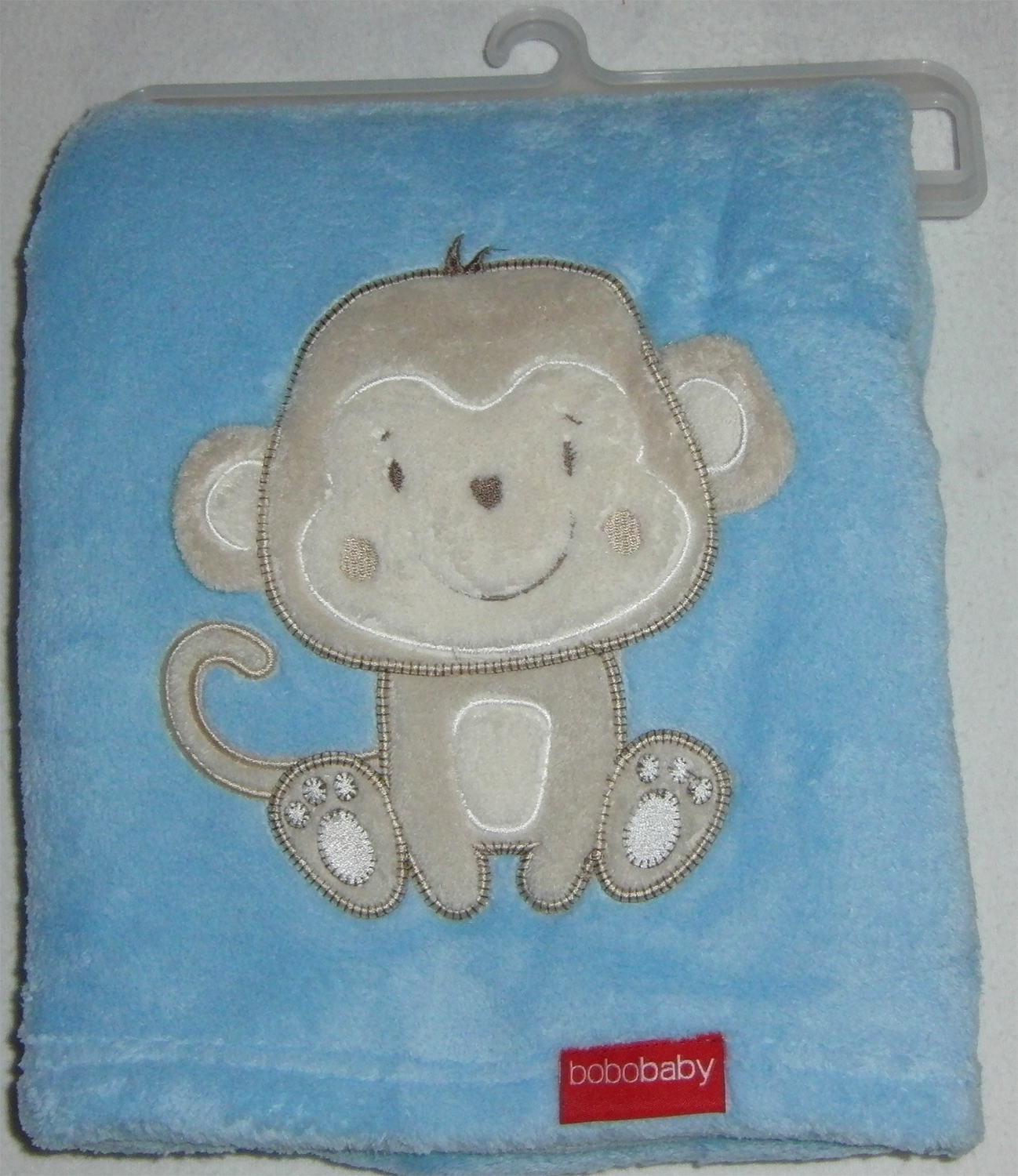 Babydecke mit Affe in hellblau personalisiert