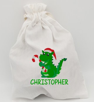 Cremeweißer Nikolausbeutel mit grünem Weihnachtsdrachen und aufgesticktem Namen Christopher
